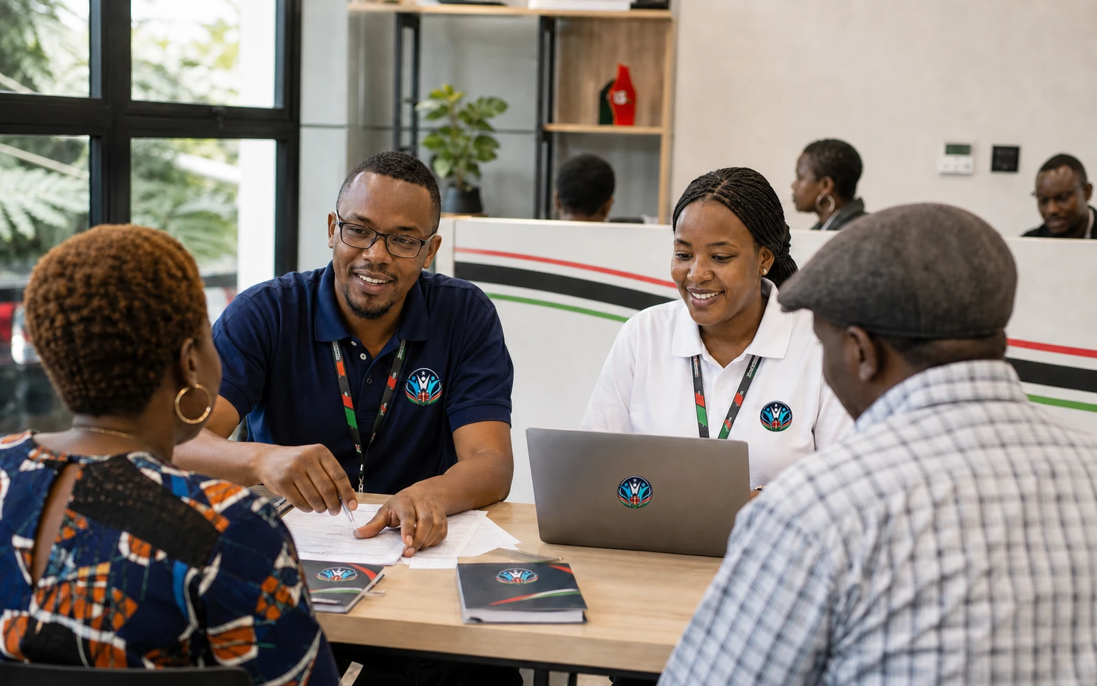 Leadership Sio Kelele volunteers assisting citizens at a help desk